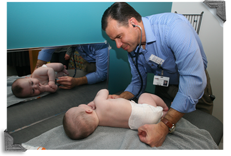 Dr. James Liesen with infant patient