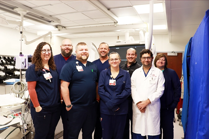 CMH STEMI team staff standing in front of equipment